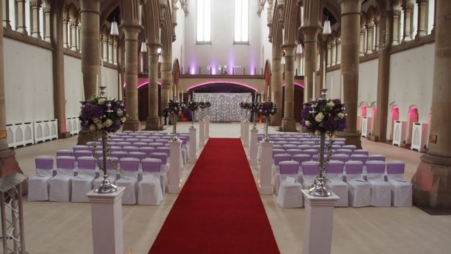 Weddings at The Monastery Manchester Flowers Stunning Wedding Backdrop Red Carpet
