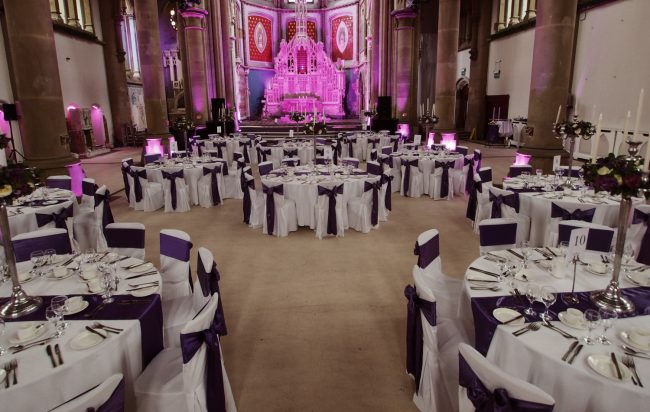 Corporate Dinner Chair Covers & Cadbury Purple Satin Sashes Table Runner Floral Candelabras