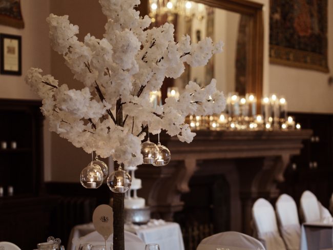 White Blossom Tree with Hanging Tealights at Peckforton Castle Wedding