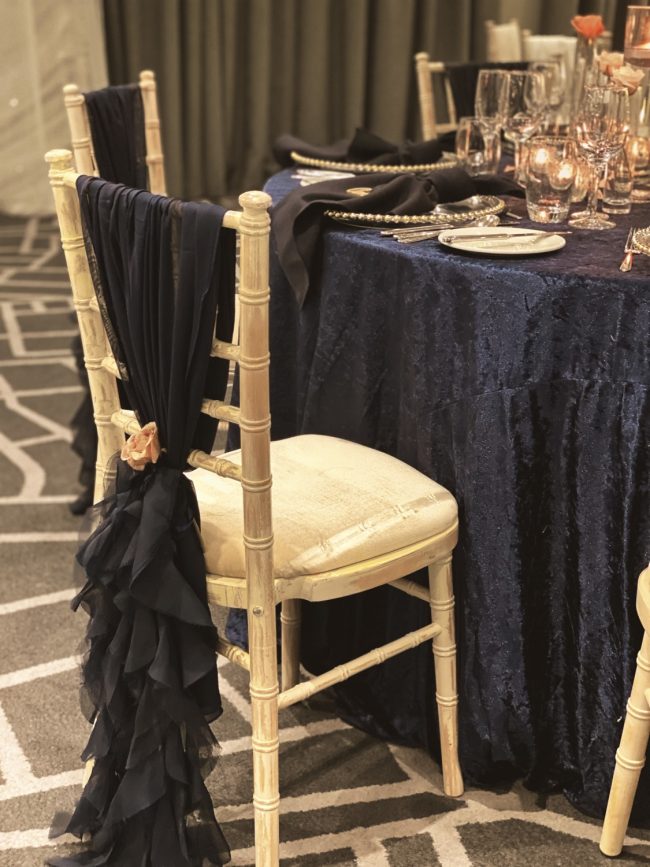 Chiavari Chair with Navy Ruffle and pink flower chair accessory